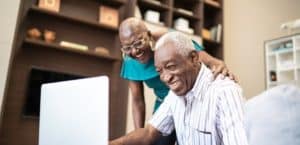 Older workers using laptop