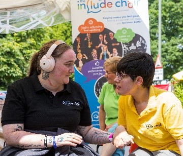 Supported Trustee Beth, from Include.org. having a conversation.